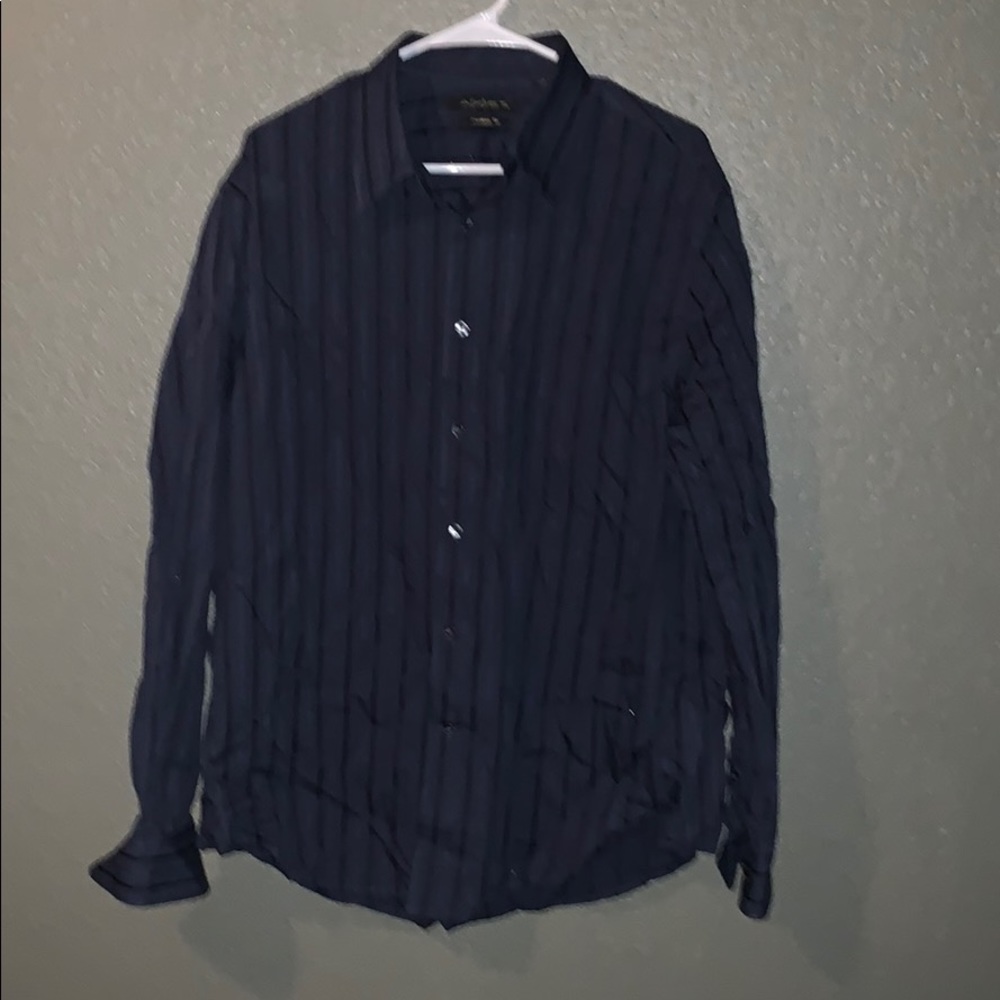 Long sleeve blue and black dress shirt.